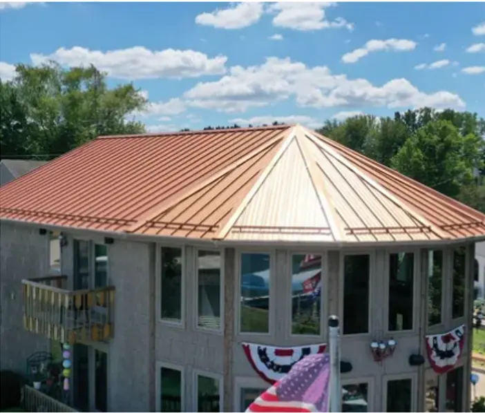 Tarping and dry-in on a Spyglass Falls commercial roof